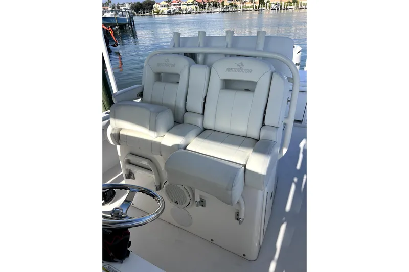  Yacht Photos Pics 2018 Regulator 34 Center Console boat seats with waterfront view.