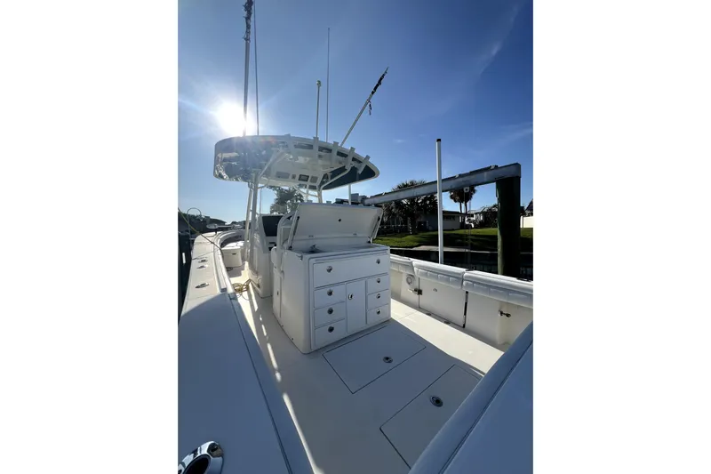  Yacht Photos Pics 2018 Regulator 34 Center Console boat with open deck and storage compartments.