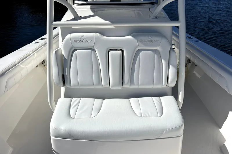  Yacht Photos Pics 2018 Regulator 34 Center Console boat with white cushioned seating.
