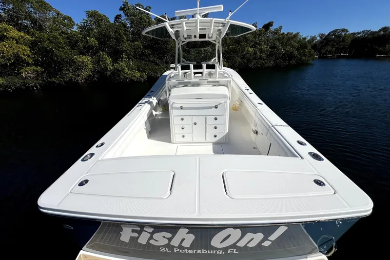  Yacht Photos Pics 2018 Regulator 34 Center Console boat on water, labeled "Fish On!" in St. Petersburg, FL.