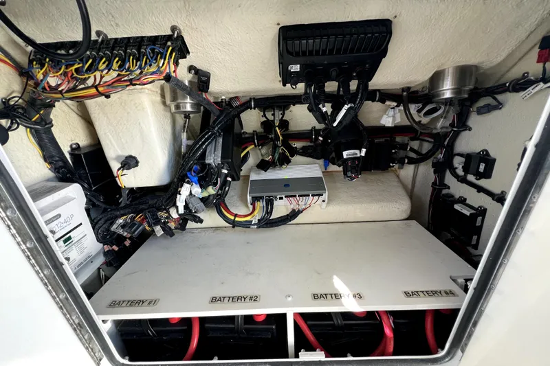  Yacht Photos Pics 2018 Regulator 34 Center Console electrical compartment with wiring and battery setup.