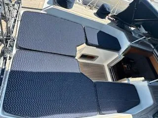 Hasard III Yacht Photos Pics Baltic 48 DP 1986 yacht deck with blue cushions.