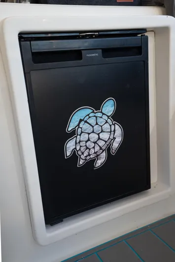  Yacht Photos Pics Black panel with turtle design on Leopard 46, 2011 model.