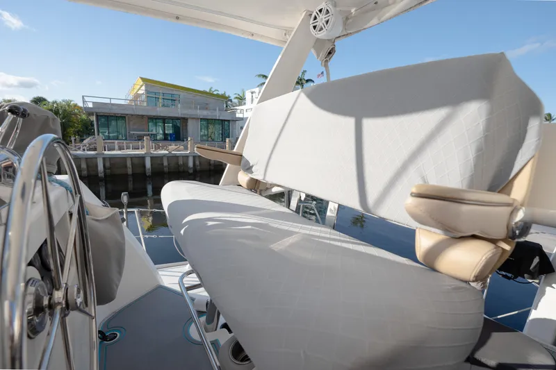  Yacht Photos Pics Luxury Leopard 46 yacht interior with modern seating, docked near waterfront building, 2011 model.