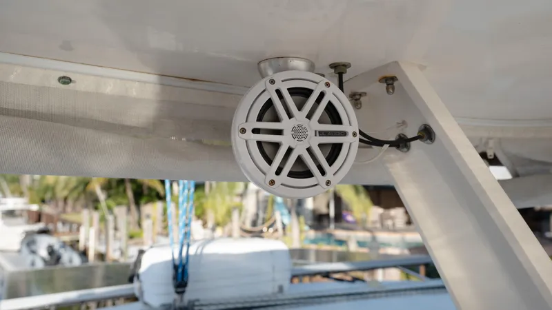  Yacht Photos Pics Speaker mounted on a 2011 Leopard 46 catamaran, with marina background.