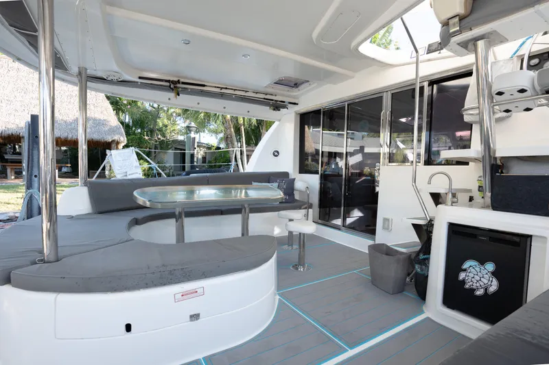  Yacht Photos Pics Spacious Leopard 46 catamaran interior, featuring modern seating and dining area, 2011 model.