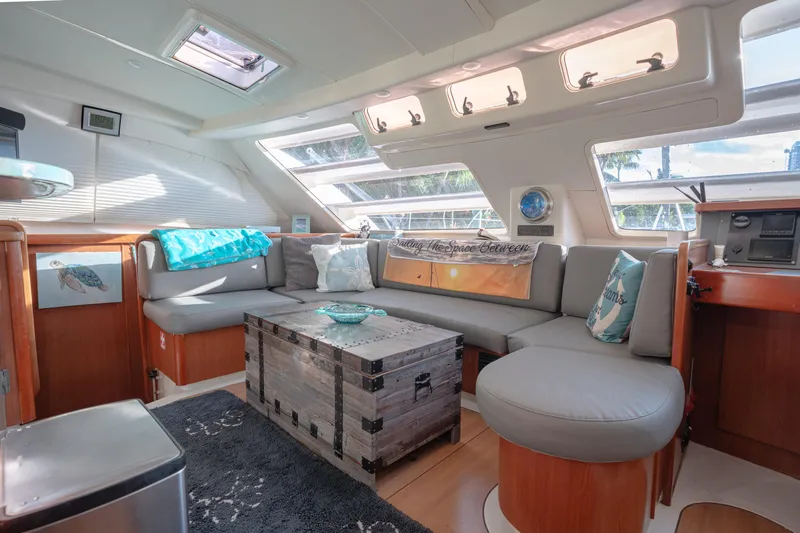  Yacht Photos Pics Luxurious interior of 2011 Leopard 46 yacht with cozy seating and nautical decor.