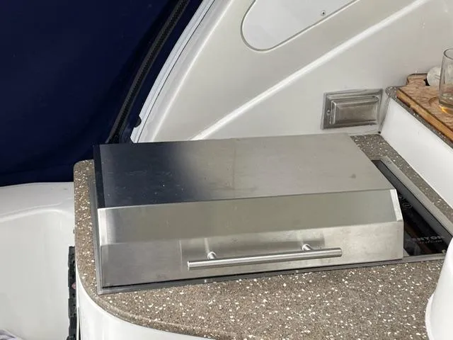  Yacht Photos Pics Stainless steel grill on 2012 Cruisers Yachts 380 Express boat deck.