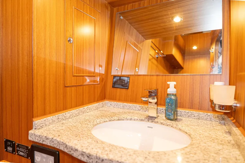 Northern Reign Yacht Photos Pics Luxury bathroom in 2020 North Pacific 45 Pilothouse yacht with granite countertop.