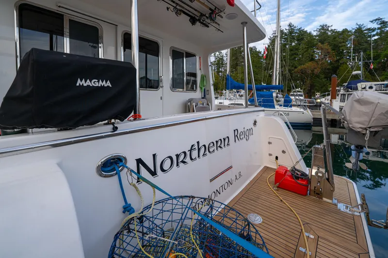 Northern Reign Yacht Photos Pics North Pacific 45 Pilothouse 2020 yacht docked, featuring deck and fishing gear.