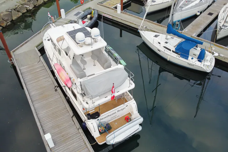 Northern Reign Yacht Photos Pics Aerial view of 2020 North Pacific 45 Pilothouse yacht docked at marina.