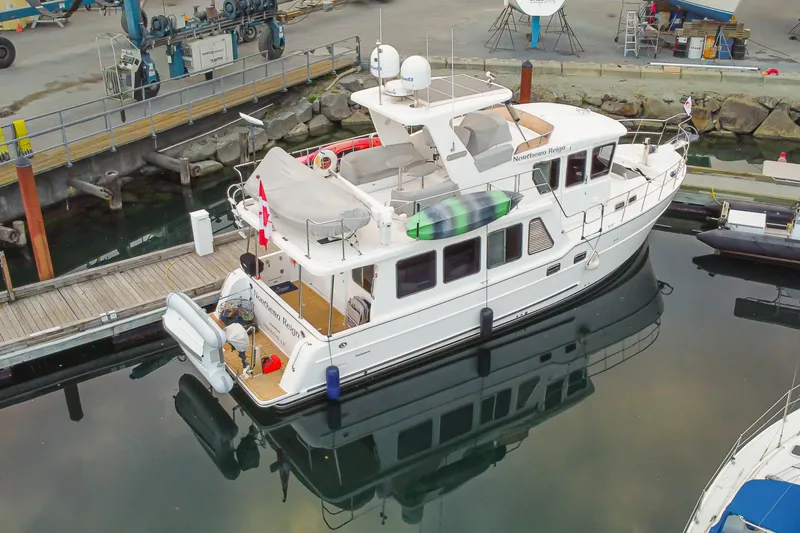 Northern Reign Yacht Photos Pics North Pacific 45 Pilothouse 2020 yacht docked at marina, aerial view.