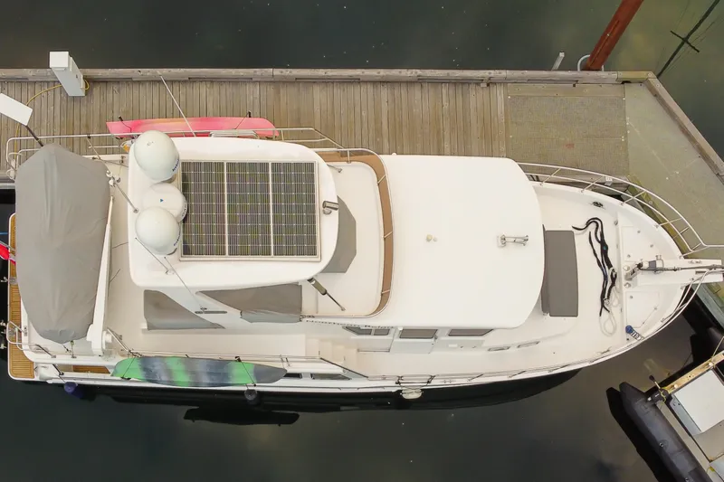 Northern Reign Yacht Photos Pics Aerial view of 2020 North Pacific 45 Pilothouse yacht docked with solar panels.