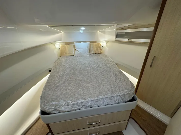  Yacht Photos Pics Luxurious cabin interior of 2023 Regal 360 Grande Coupe yacht with cozy bed.