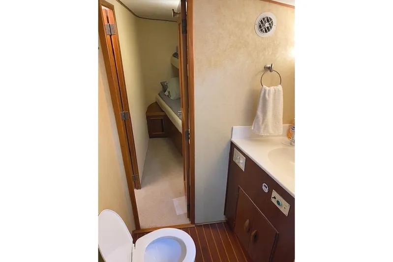 Swamp Fox Yacht Photos Pics Bathroom and hallway inside a 1989 Buddy Davis 61 Sportfish yacht.