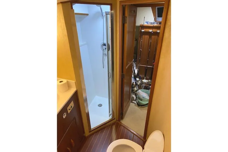 Swamp Fox Yacht Photos Pics Bathroom and shower area on a 1989 Buddy Davis 61 Sportfish yacht.
