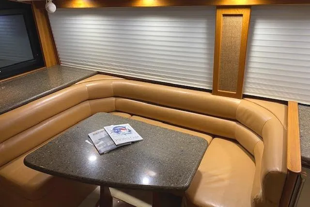 Swamp Fox Yacht Photos Pics Luxurious interior of 1989 Buddy Davis 61 Sportfish with leather seating and granite table.