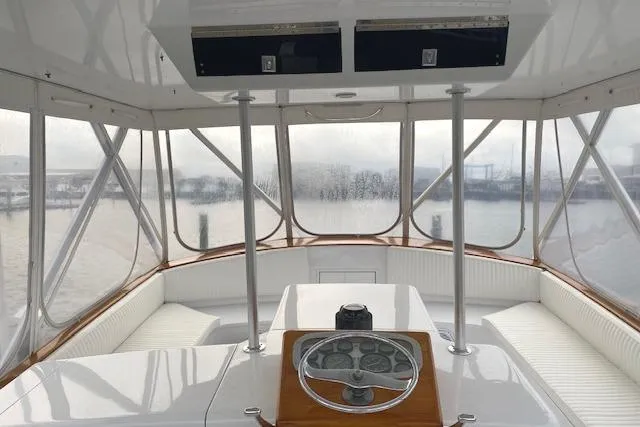 Swamp Fox Yacht Photos Pics 1989 Buddy Davis 61 Sportfish helm with panoramic marina view.