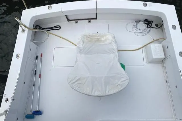 Swamp Fox Yacht Photos Pics 1989 Buddy Davis 61 Sportfish boat deck with fishing chair and equipment.