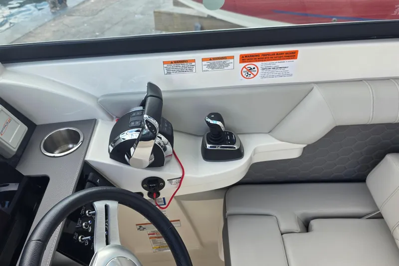  Yacht Photos Pics 2021 Sea Ray SDX 290 Outboard helm with controls and cup holder.