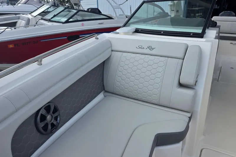  Yacht Photos Pics 2021 Sea Ray SDX 290 Outboard boat interior with luxurious seating and speaker system.