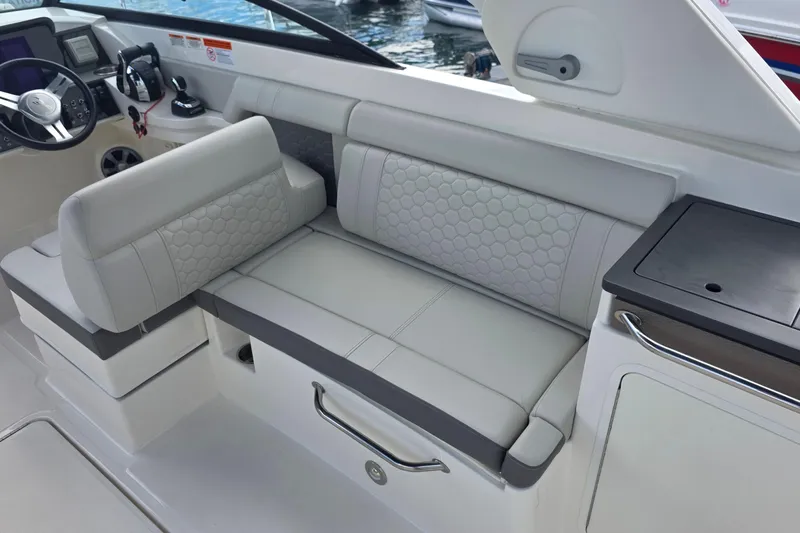  Yacht Photos Pics 2021 Sea Ray SDX 290 Outboard interior with luxurious seating and modern dashboard.