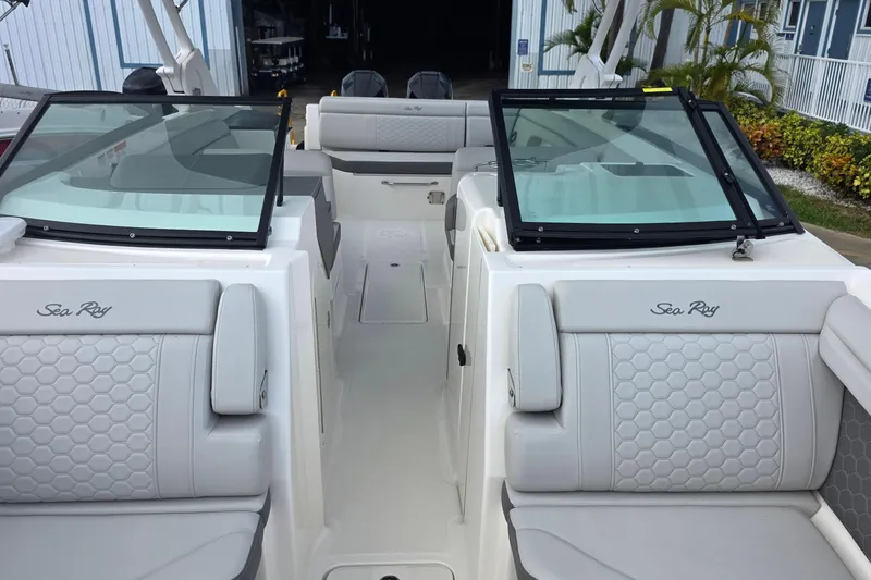  Yacht Photos Pics 2021 Sea Ray SDX 290 Outboard boat interior with luxurious seating and windshield.