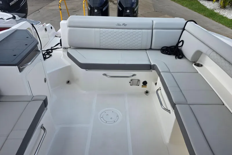  Yacht Photos Pics 2021 Sea Ray SDX 290 Outboard boat interior with spacious seating and modern design.