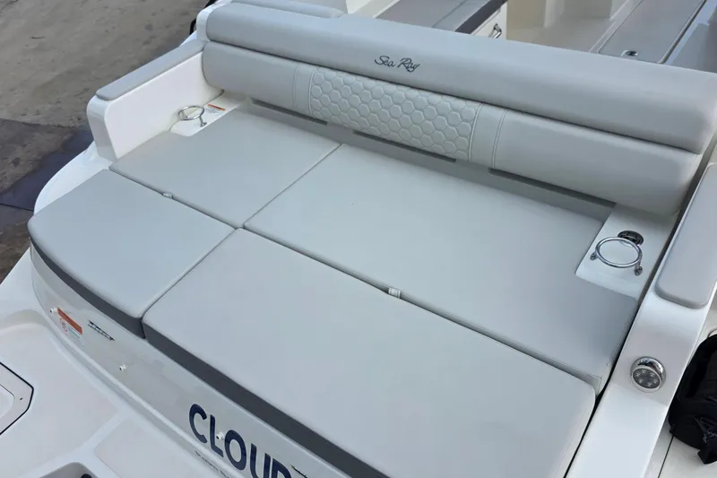  Yacht Photos Pics 2021 Sea Ray SDX 290 Outboard boat with cushioned seating and cup holders.