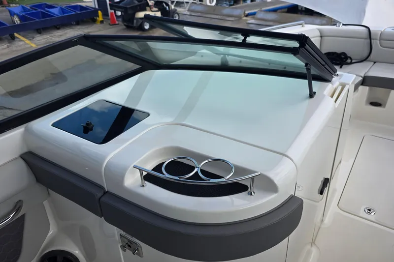  Yacht Photos Pics 2021 Sea Ray SDX 290 Outboard boat interior with windshield and cup holders.