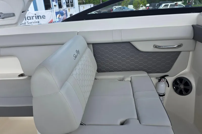  Yacht Photos Pics 2021 Sea Ray SDX 290 Outboard interior with gray seating and safety equipment.