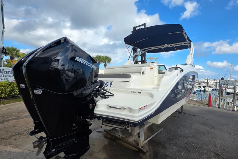  Yacht Photos Pics 2021 Sea Ray SDX 290 Outboard boat with Mercury engine at marina.