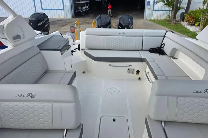  Yacht Photos Pics 2021 Sea Ray SDX 290 Outboard boat interior with luxurious seating and modern design.