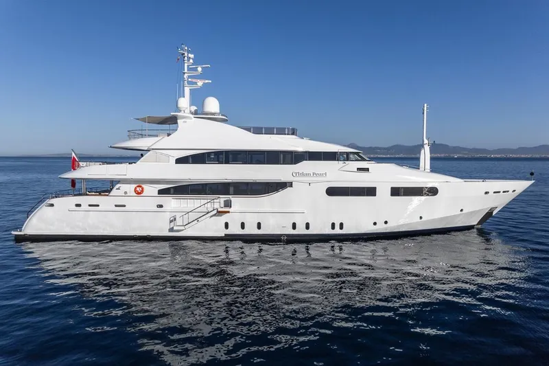 Titian Pearl Yacht Photos Pics Luxurious 2001 CRN Magnifica yacht on calm blue waters.