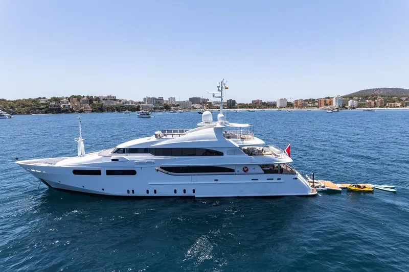 Titian Pearl Yacht Photos Pics Luxurious 2001 CRN Magnifica yacht anchored in scenic coastal waters.