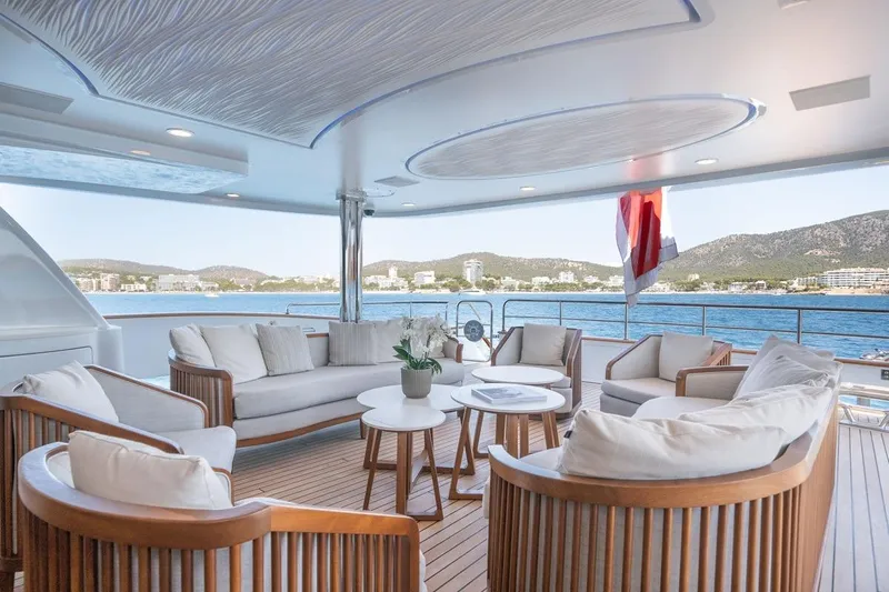 Titian Pearl Yacht Photos Pics Luxurious CRN Magnifica yacht deck with elegant seating, ocean view, and modern design, 2001 model.