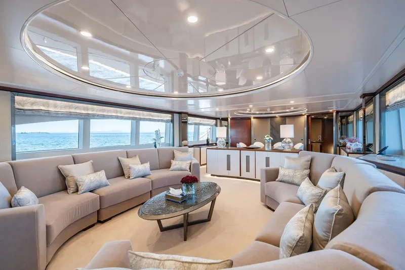 Titian Pearl Yacht Photos Pics Luxurious interior of 2001 CRN Magnifica yacht with elegant seating and ocean view.