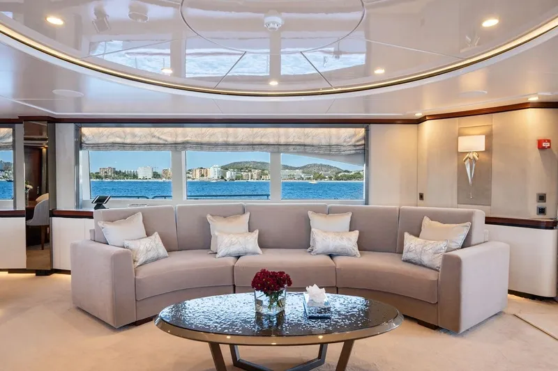 Titian Pearl Yacht Photos Pics Luxurious interior of 2001 CRN Magnifica yacht with elegant seating and ocean view.