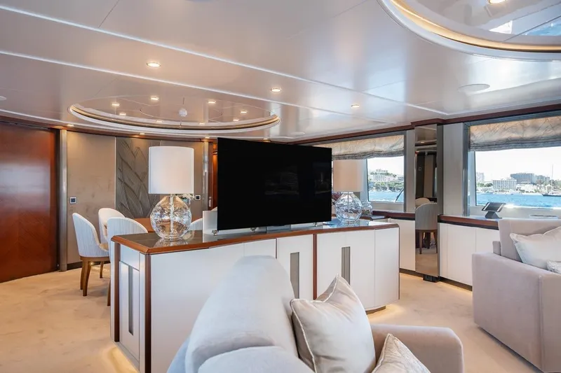 Titian Pearl Yacht Photos Pics Luxurious interior of 2001 CRN Magnifica yacht with elegant furnishings and large windows.