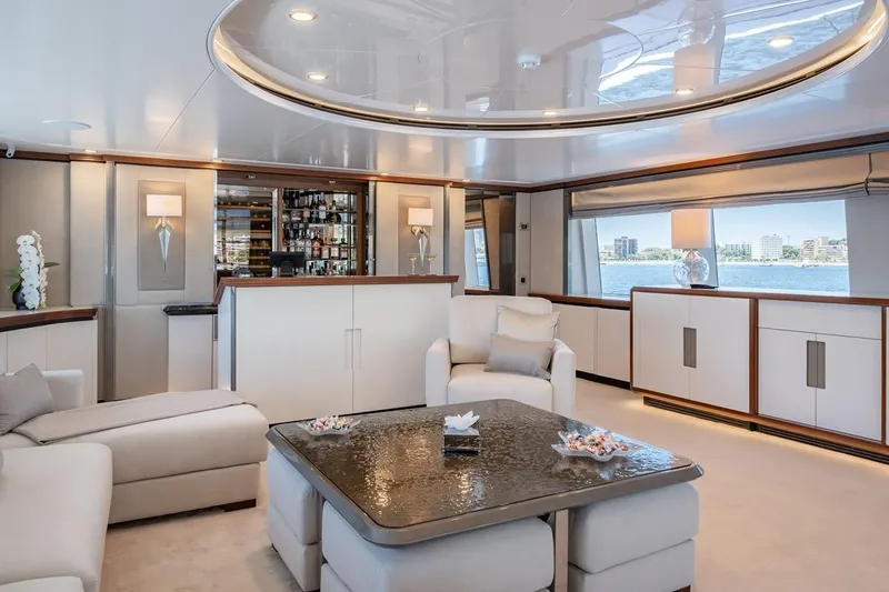 Titian Pearl Yacht Photos Pics Luxurious interior of 2001 CRN Magnifica yacht with elegant furnishings and panoramic windows.