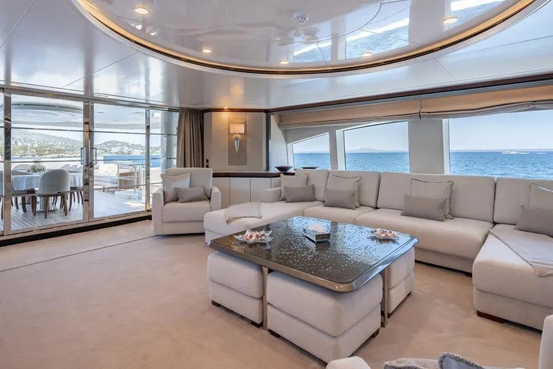 Titian Pearl Yacht Photos Pics Luxurious yacht interior with elegant seating, ocean view, and modern decor on CRN Magnifica 2001.