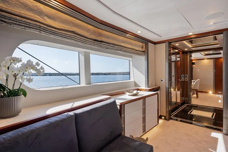 Titian Pearl Yacht Photos Pics Luxurious interior of 2001 CRN Magnifica yacht with elegant decor and ocean view.