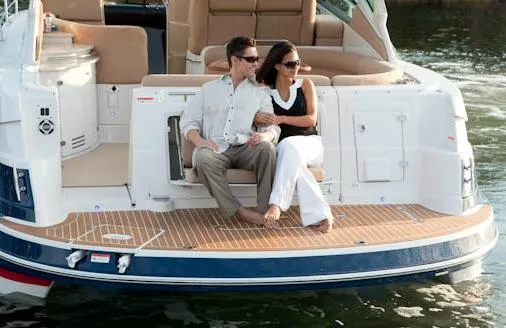  Yacht Photos Pics Manufacturer Provided Image: Couple relaxing on a 2013 Four Winns Vista 375 boat.