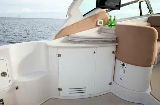  Yacht Photos Pics Manufacturer Provided Image: Interior of 2013 Four Winns Vista 375 boat with seating and storage.