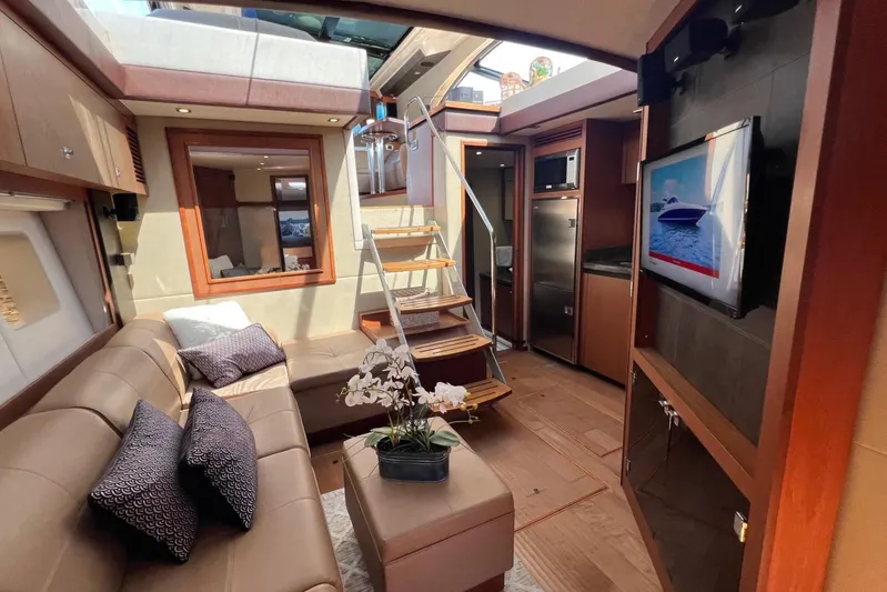 Party Of 5 Yacht Photos Pics Luxurious interior of 2014 Sea Ray 510 Sundancer yacht with modern furnishings and elegant design.