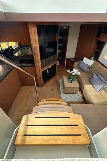 Party Of 5 Yacht Photos Pics Interior of 2014 Sea Ray 510 Sundancer yacht with modern kitchen and cozy seating area.