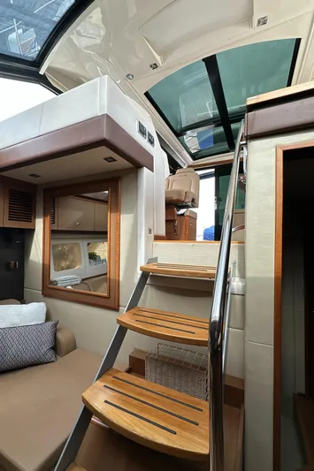 Party Of 5 Yacht Photos Pics Interior of 2014 Sea Ray 510 Sundancer yacht with wooden stairs and modern design.