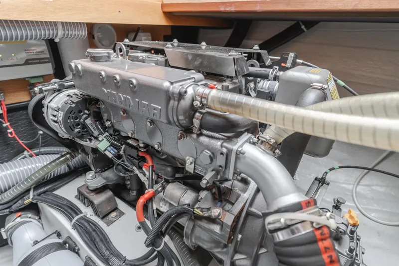 Limoncello Yacht Photos Pics Engine compartment of a 2016 Lagoon 450F yacht, showcasing detailed mechanical components.