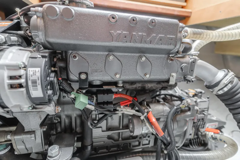 Limoncello Yacht Photos Pics Engine of a 2016 Lagoon 450F catamaran, featuring Yanmar components and wiring.