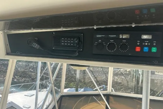 Arete Yacht Photos Pics Control panel of a 1988 Viking 45 Convertible boat with communication equipment.